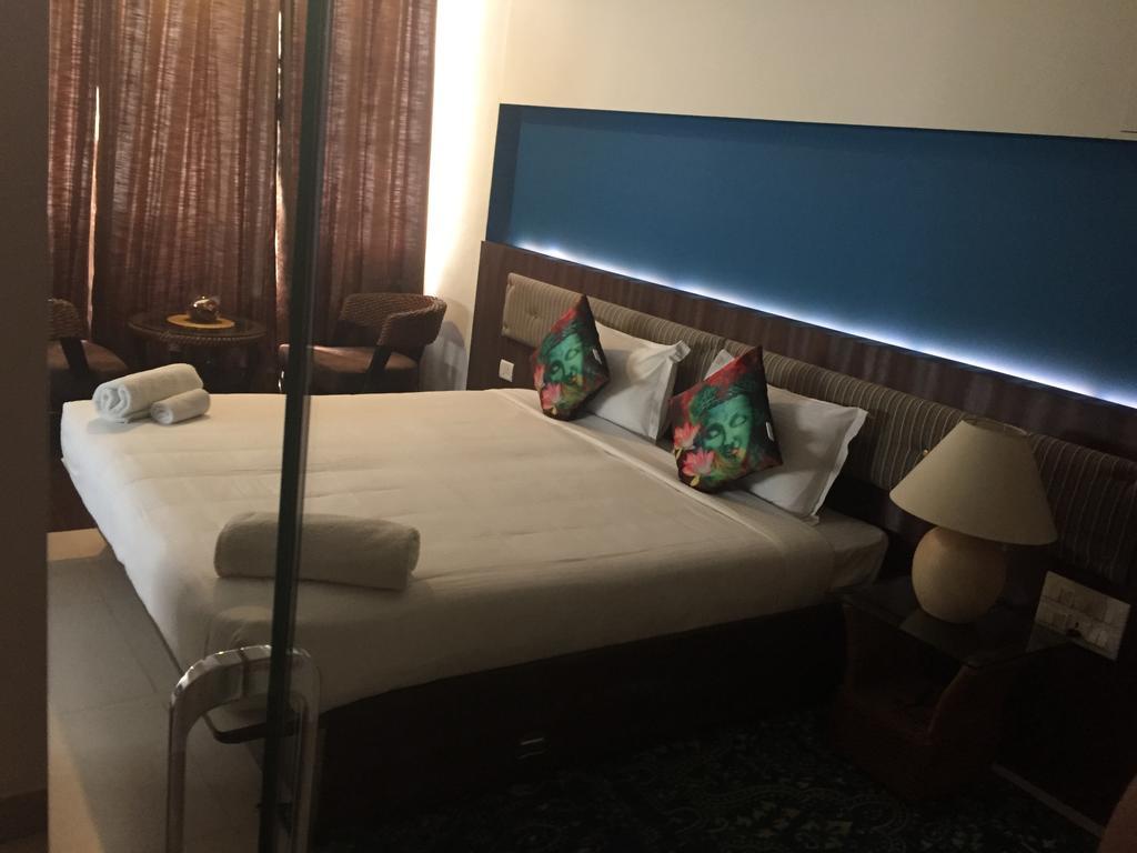 Luxtay Suites Бангалор Номер фото
