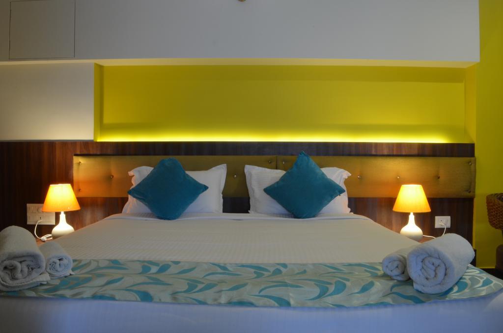 Luxtay Suites Бангалор Номер фото