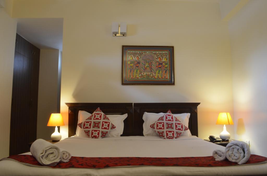 Luxtay Suites Бангалор Номер фото